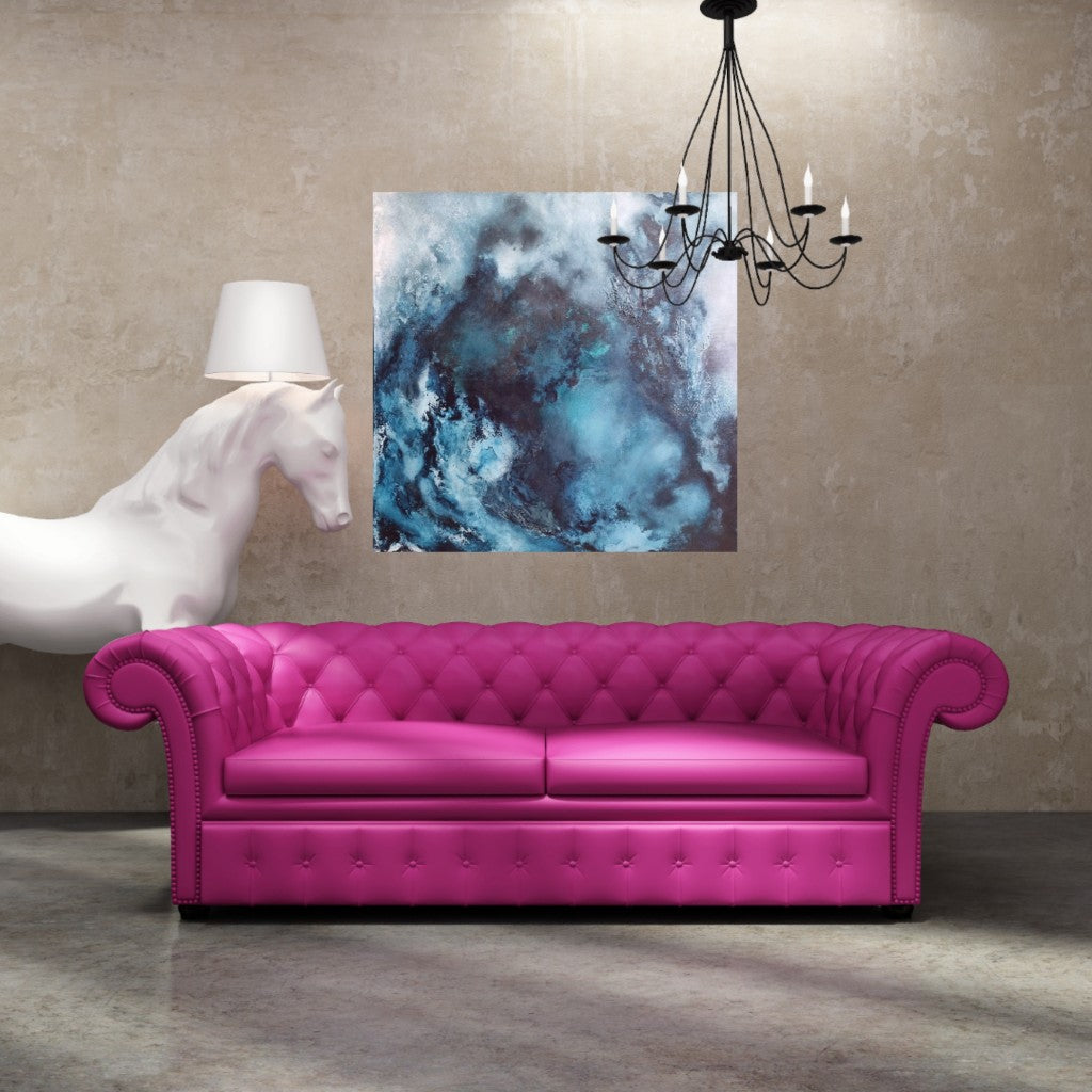 Unique blue abstract wall art above a pink sofa and big horse statue lamp.