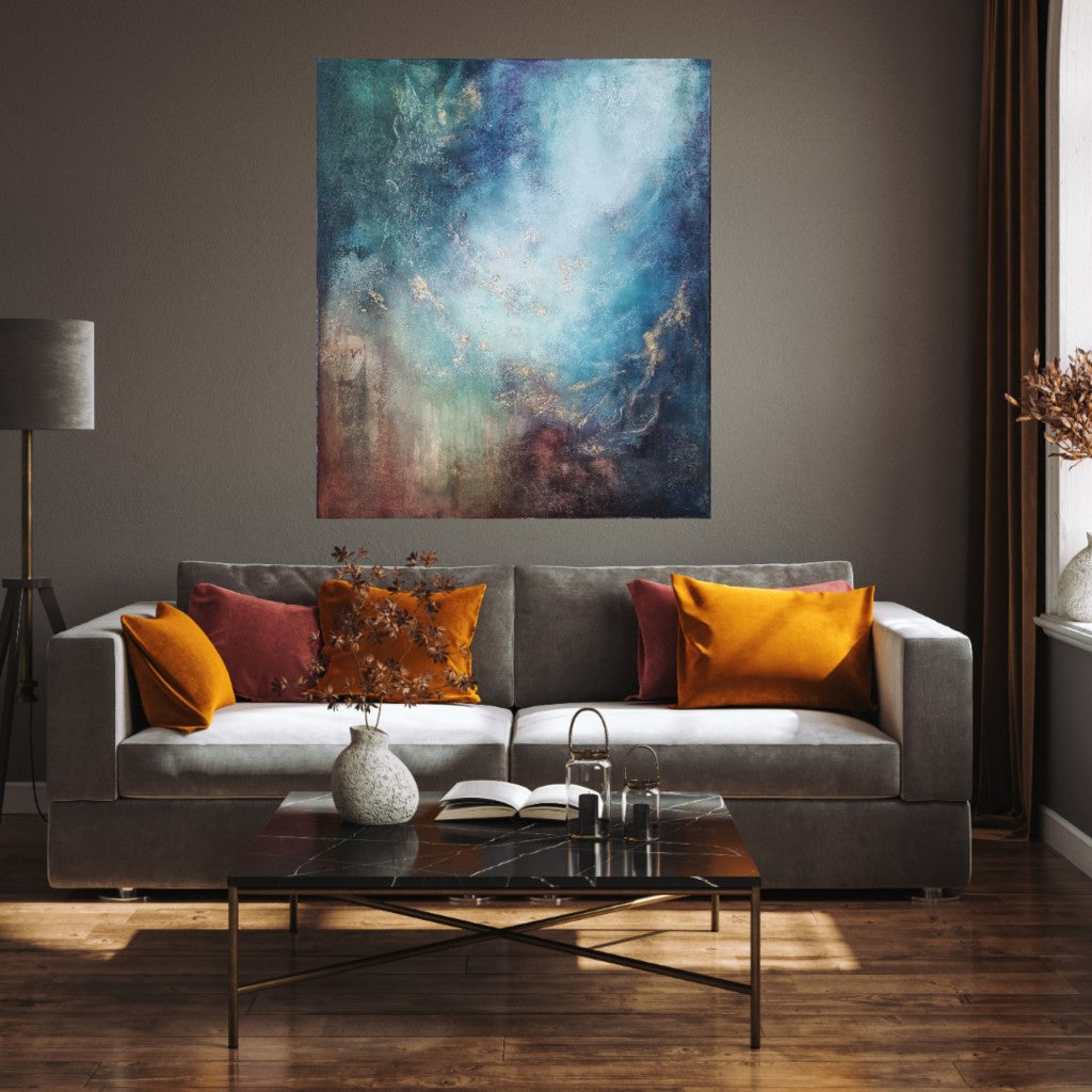 Large colorful artwork is positioned on a greige wall, in modern living room.