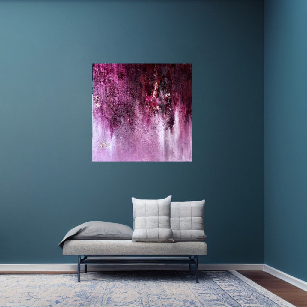 An abstract pink painting  hangs on a blue wall in a room with a gray sofa and gray rug.
