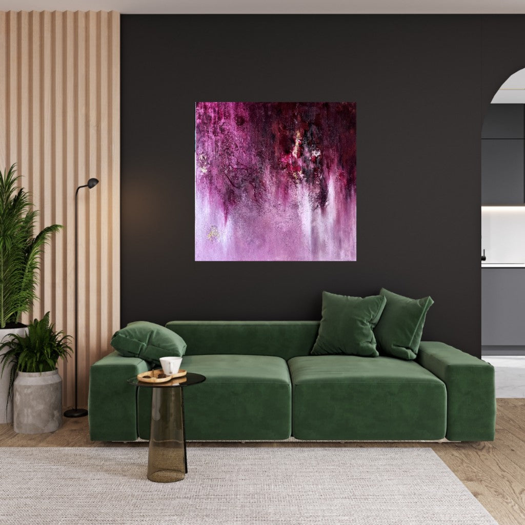 An abstract pink painting with green sofa.